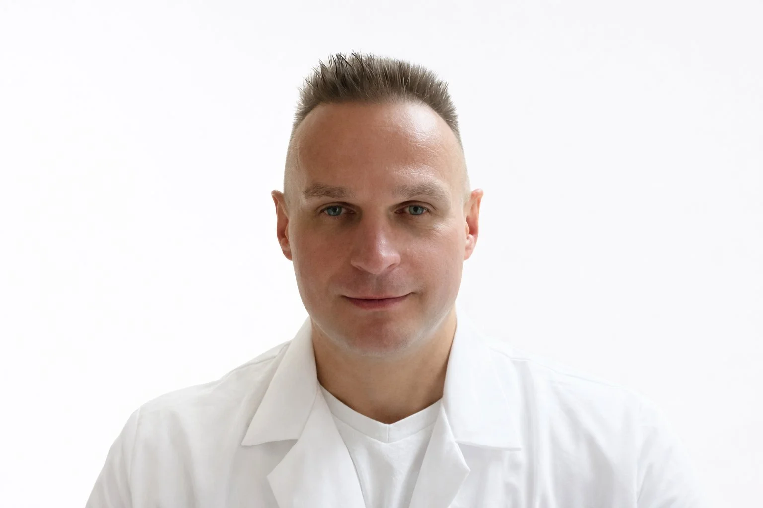 George Wood Nurse Practitioner providing anorectal assessment and minor procedures in Calgary outpatient clinic